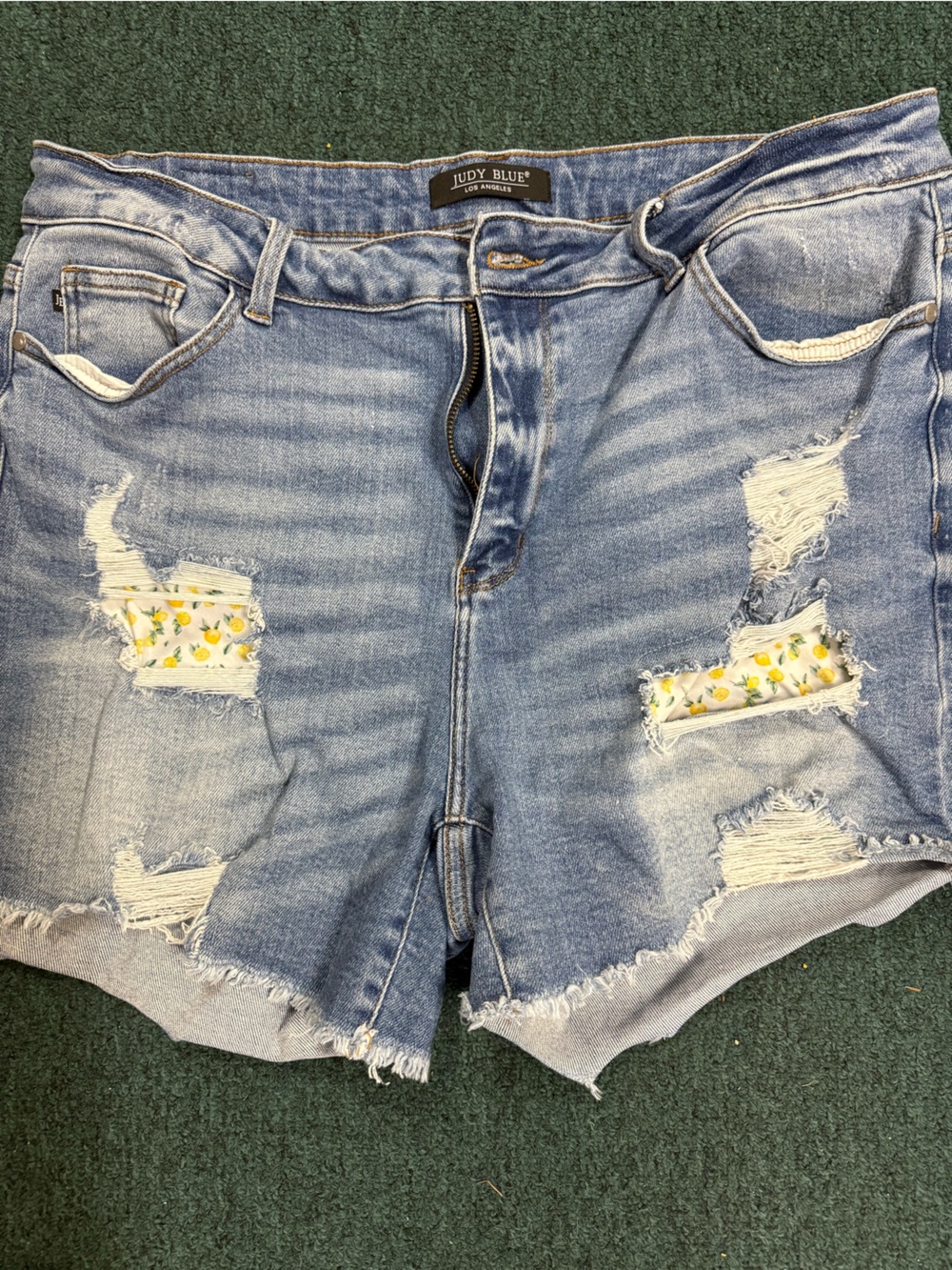 Judy Blue Light Wash Denim Jacket with Yellow Floral Patch Details